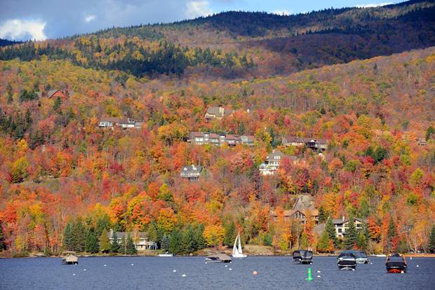 Lake Tremblant and Mont-Tremblant village in fall with fall foliage, Town of Mont-Tremblant, Quebec, Canada.